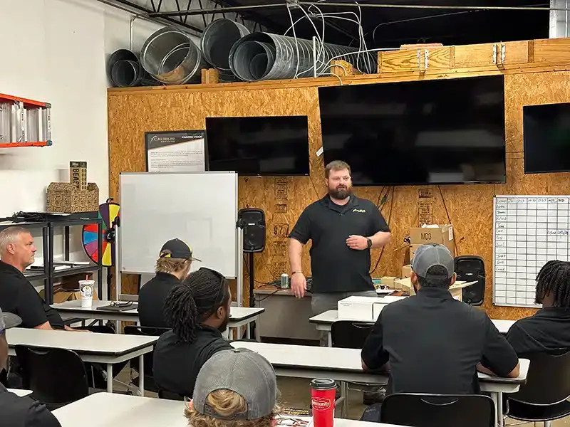 Xcalibur Services employee training in office
